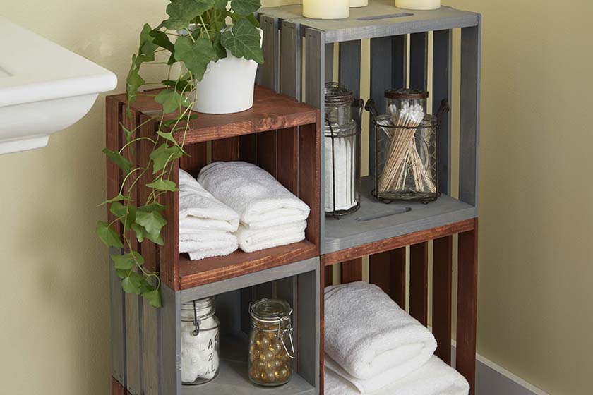 A DIY storage unit build with nothing but some old wooden crates.