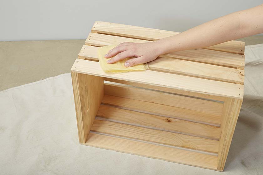 A small wooden crate is the starting point for this DIY project.